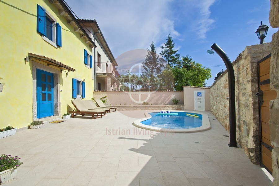 Photo of A beautiful Istrian stone house with a swimming pool on the edge of the village, near Barban