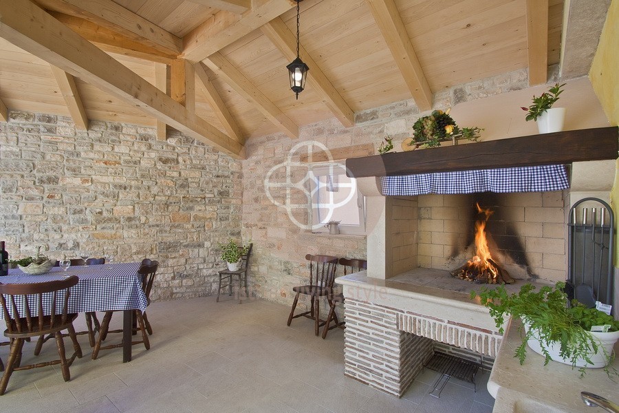 Photo of A beautiful Istrian stone house with a swimming pool on the edge of the village, near Barban