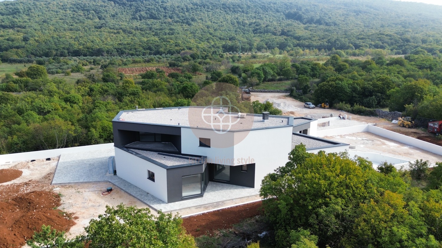 Photo of Modern villa in the final stage of construction with a large swimming pool