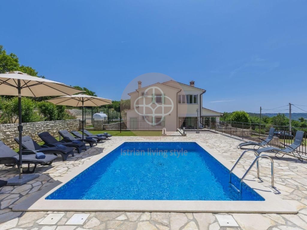 Photo of Two villas with swimming pools in idyllic surroundings