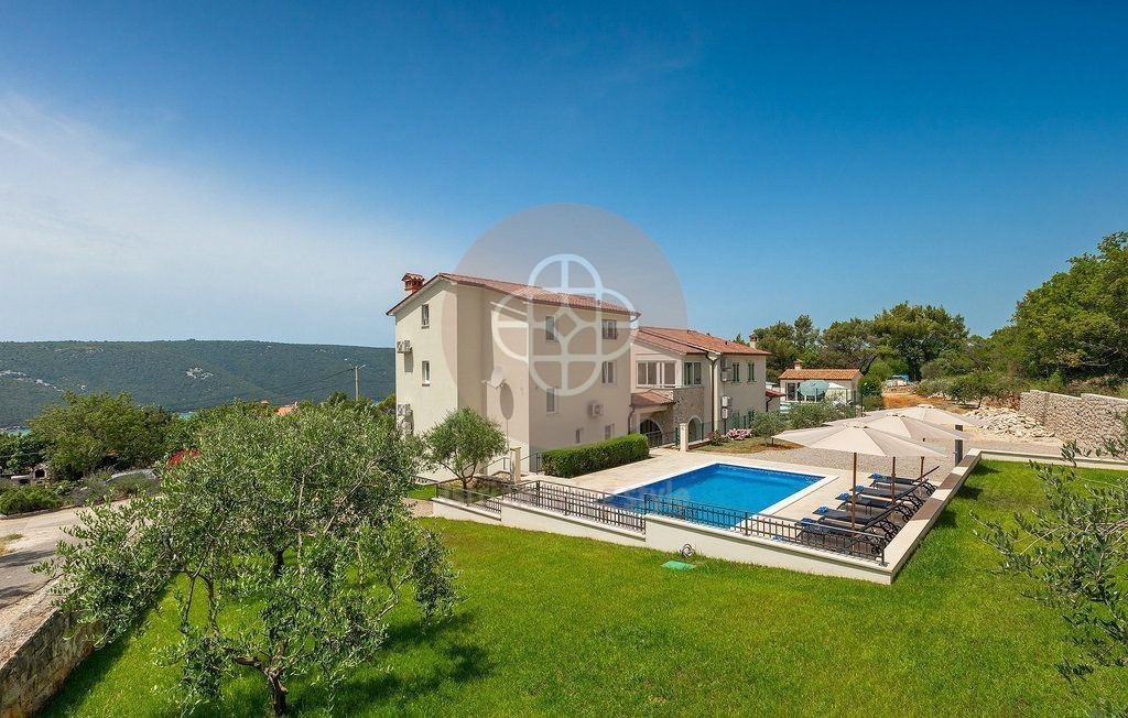 Photo of Two villas with swimming pools in idyllic surroundings