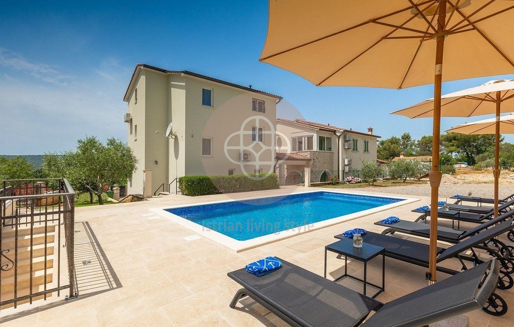 Photo of Two villas with swimming pools in idyllic surroundings