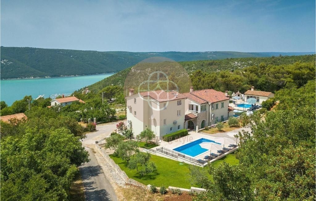 Photo of Two villas with swimming pools in idyllic surroundings