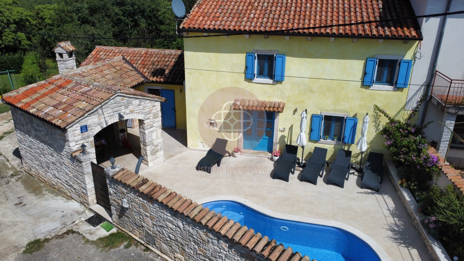 Photo of A beautiful Istrian stone house with a swimming pool on the edge of the village, near Barban