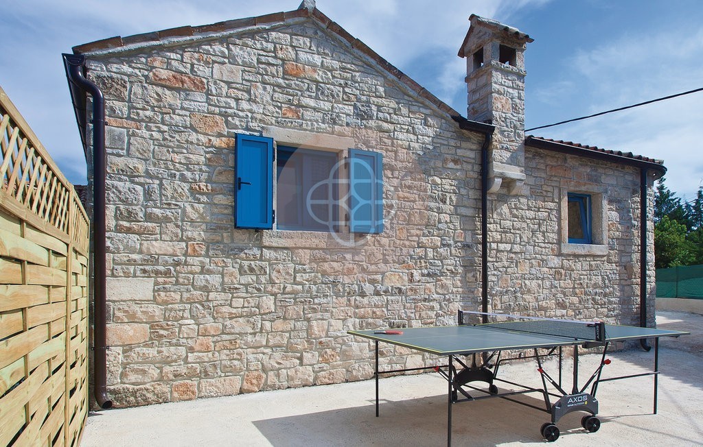 Photo of A beautiful Istrian stone house with a swimming pool on the edge of the village, near Barban