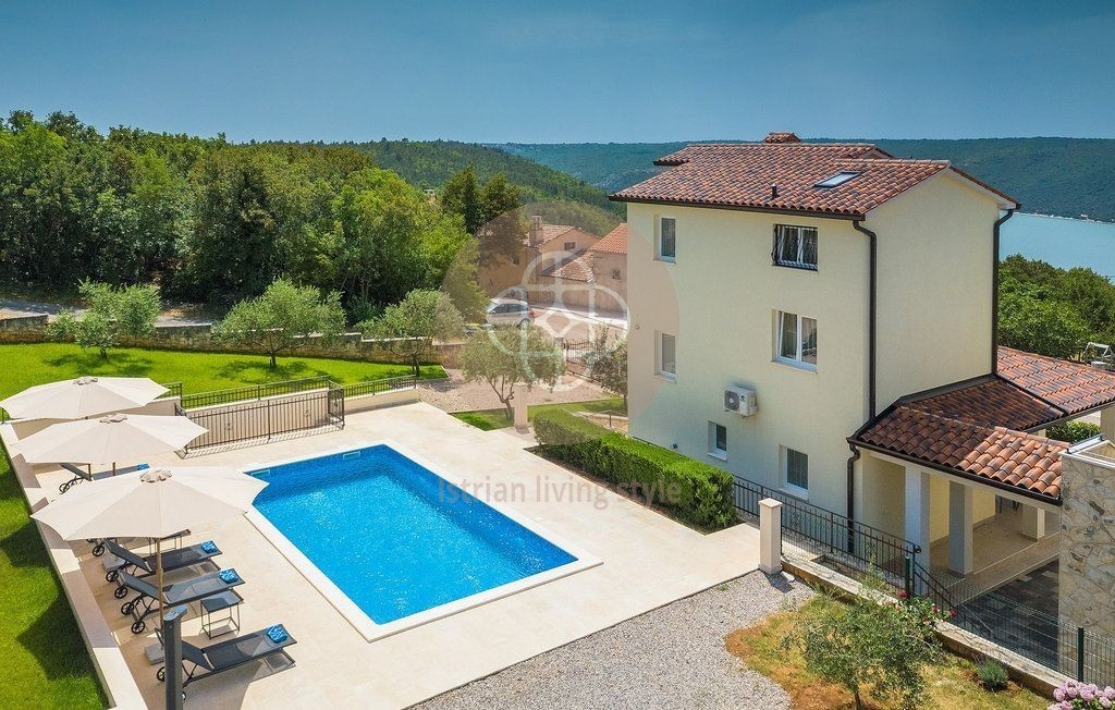 Photo of Two villas with swimming pools in idyllic surroundings