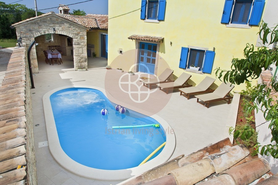 Photo of A beautiful Istrian stone house with a swimming pool on the edge of the village, near Barban