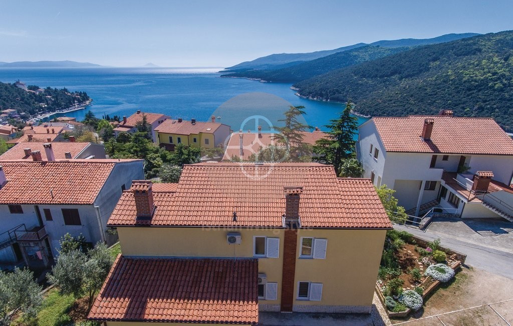 House with 2 apartments right by the sea + studio apartment + garage # RABAC Accommodation in Labin
