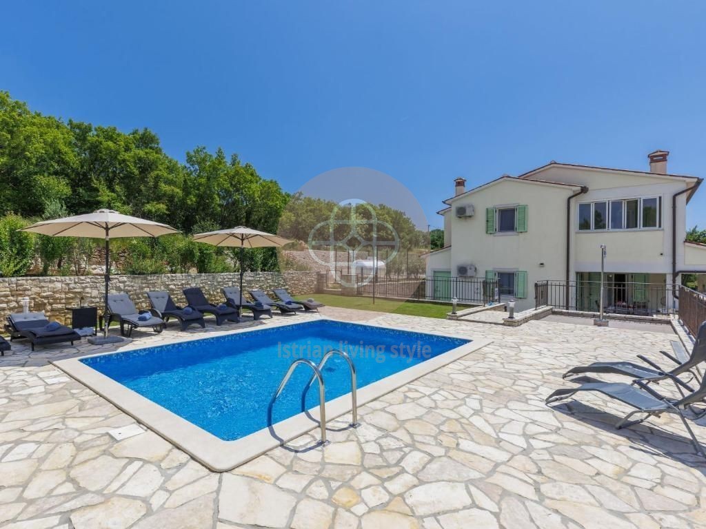 Photo of Two villas with swimming pools in idyllic surroundings