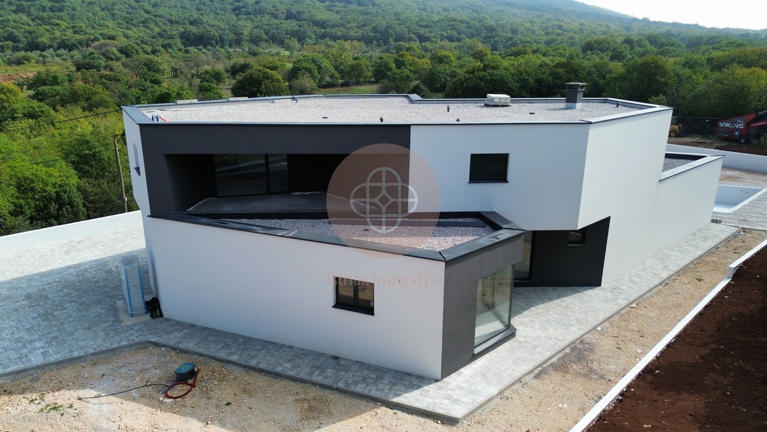 Photo of Modern villa in the final stage of construction with a large swimming pool