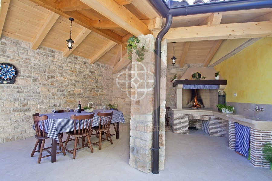 Photo of A beautiful Istrian stone house with a swimming pool on the edge of the village, near Barban