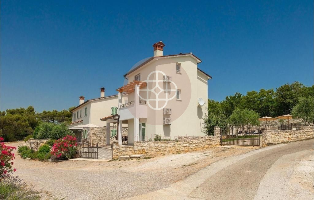 Photo of Two villas with swimming pools in idyllic surroundings