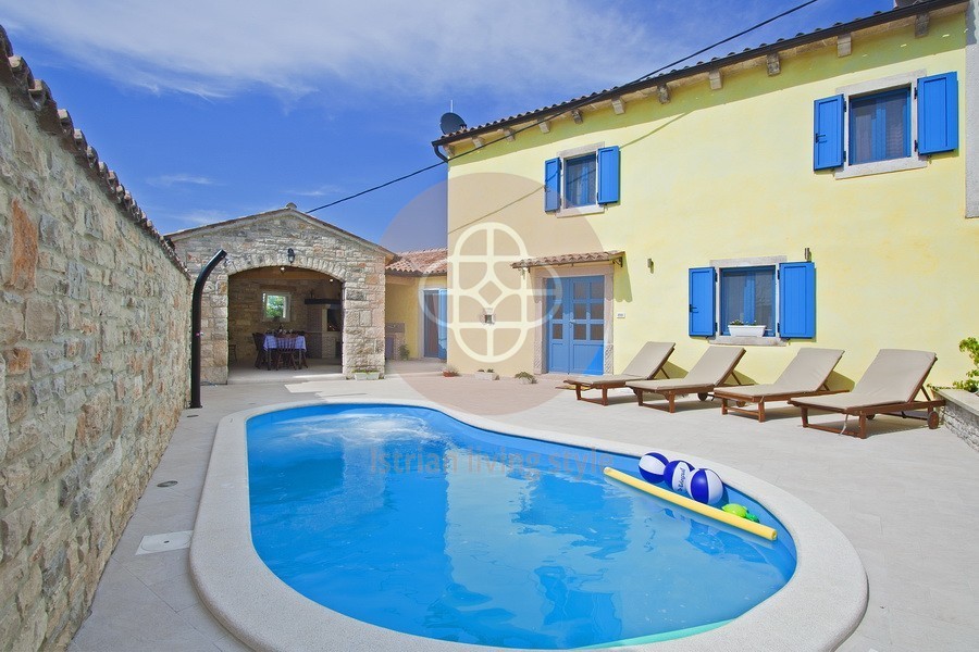 Photo of A beautiful Istrian stone house with a swimming pool on the edge of the village, near Barban