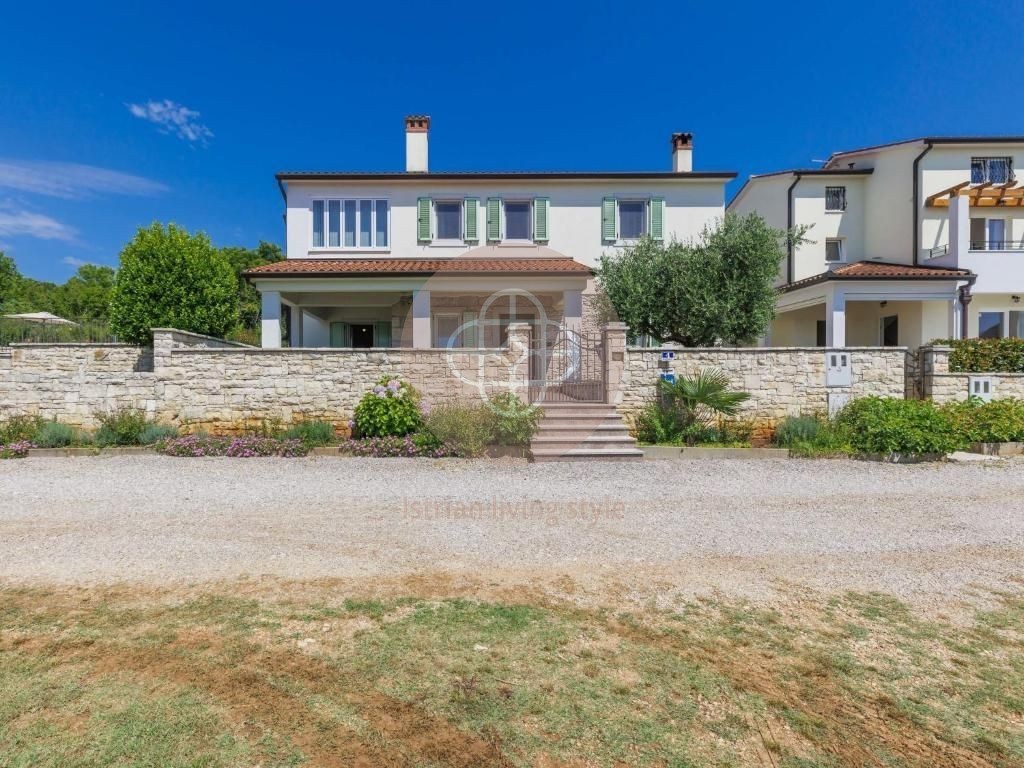 Photo of Two villas with swimming pools in idyllic surroundings