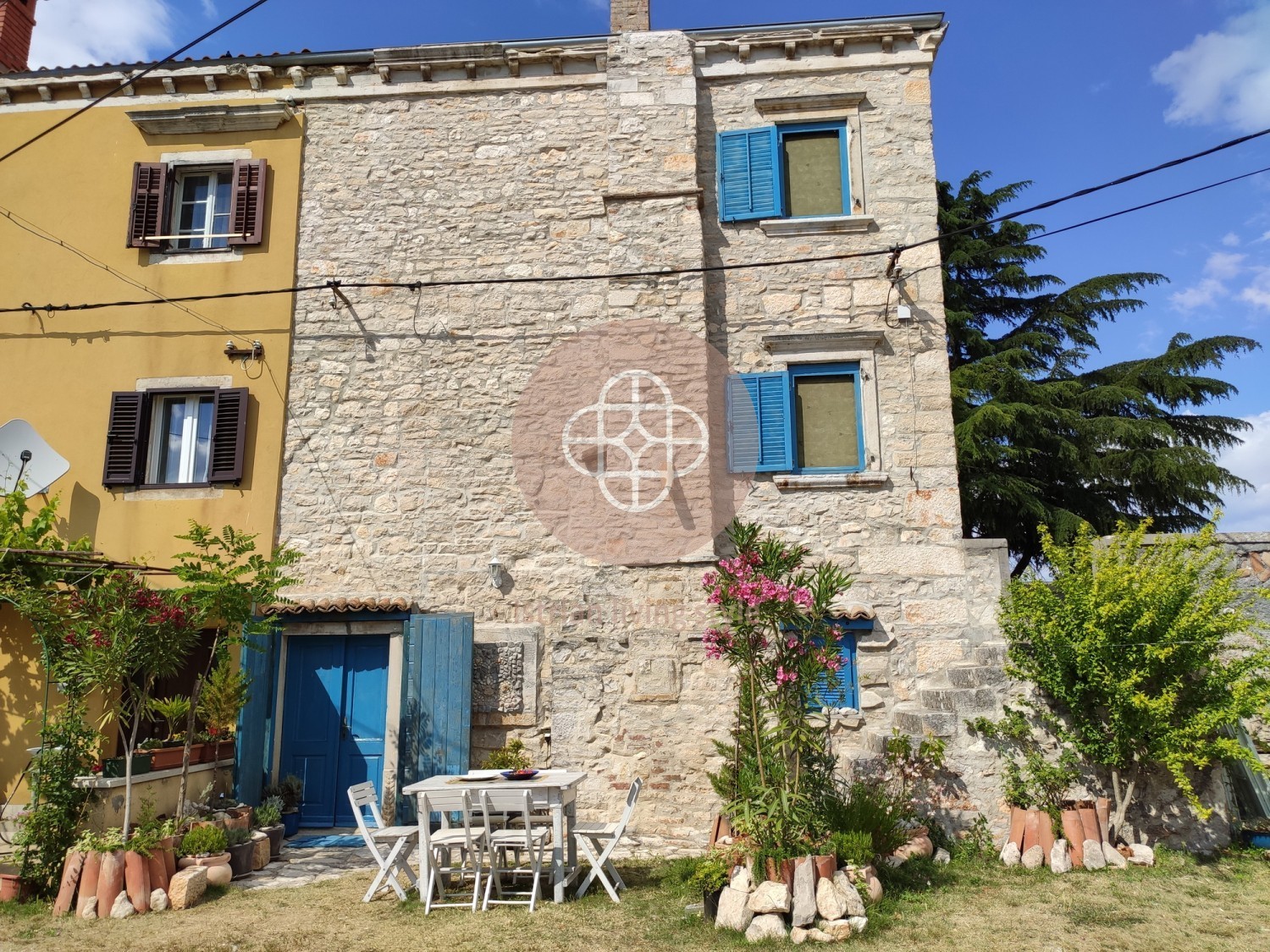 Photo of Fancy traditional artist house in exposed location *stone house*